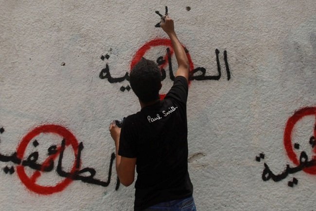 الشيعة بين مطرقة الوصاية الإعلامية وسندان التحريم السياسي والفيتو الطائفي